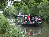 A group of people on the Bruce Trust barge called "Hannah", travelling along the Kennet and Avon canal