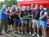 Members of the Feelgood Fitness team celebrate after collecting their winners' medals at Dragon Boat Day 2009