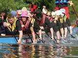 A close-up of a team battling it out in a Dragon Boat race