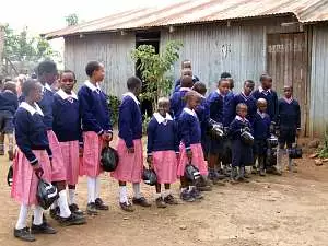 A group of school children in their new school uniforms