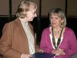 President Diane Clarke presents Louise Thomas with her Paul Harris fellowship