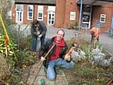 One Rotary club member breaks his broom!