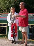 President Sulwen Vaughan presents life jackets to David Bruce