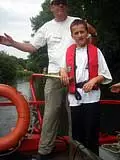 A guest steering the barge