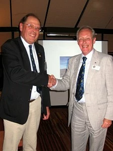 District Governor Elect Niall Blair (right) congratulates Andrew Bartholomew on receiving his Paul Harris Sapphire