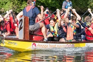 Teams racing in Rotary Dragon Boat Day