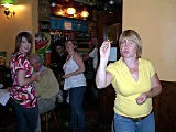 Ladies playing darts